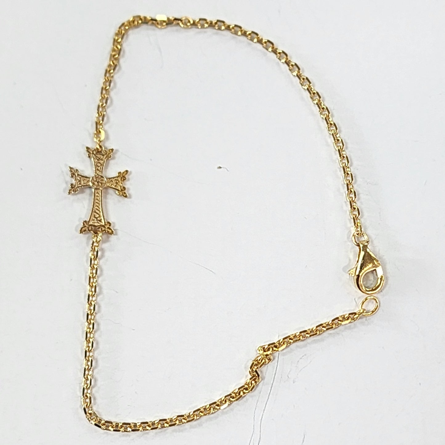 gold cross bracelet